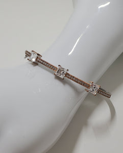 Sterling Silver Crystal Bangle With Rose Gold Accent